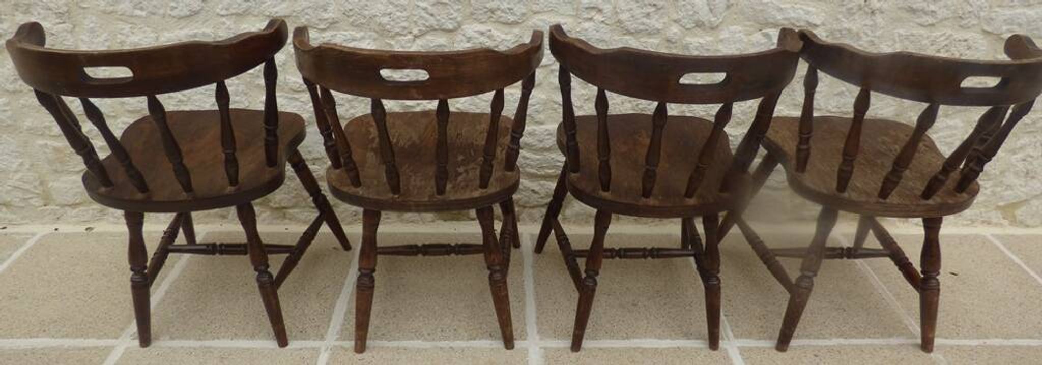 4 solid wood chairs in western style called "smockers chairs", in oak.