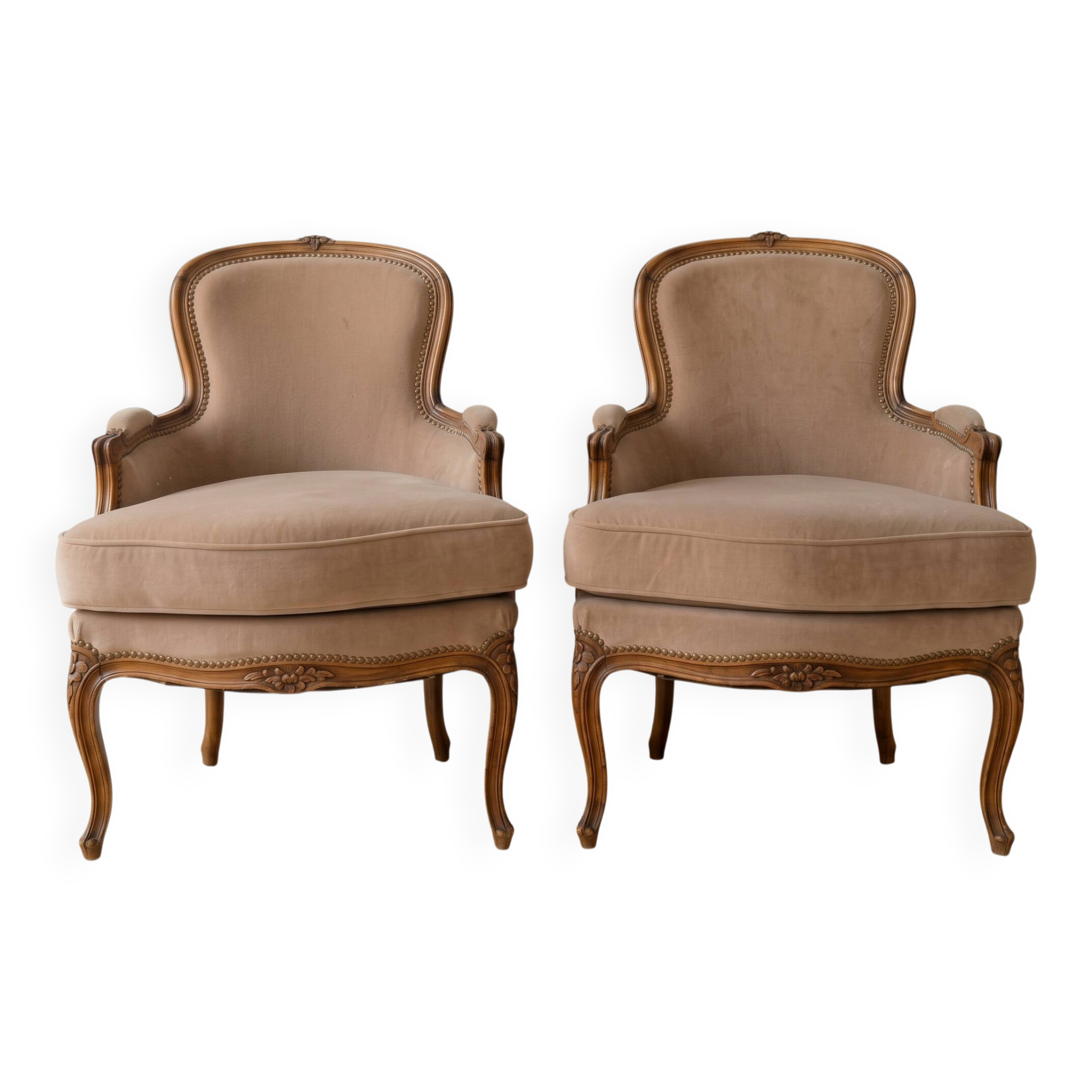 Pair of Louis XV armchairs in wood and beige fabric.
