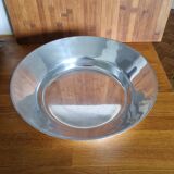 Large round hollow metal dish
