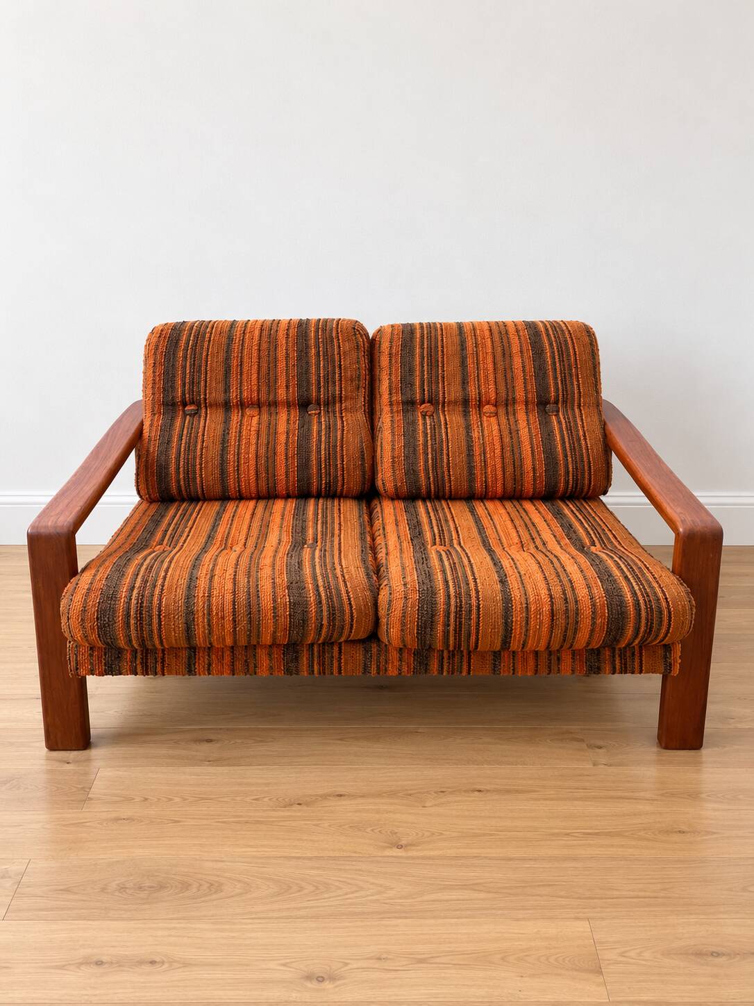 Vintage Scandinavian living room from the 1970s in teak and fabric.
