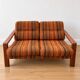 Vintage Scandinavian living room from the 1970s in teak and fabric.