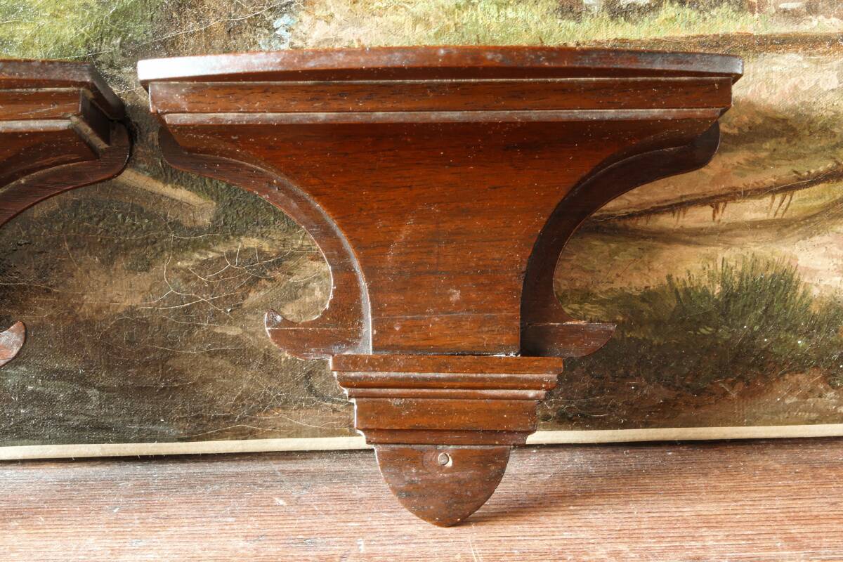 Pair of wall consoles in mahogany