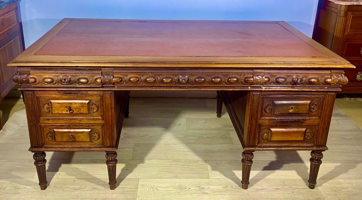 Renaissance style desk in solid oak, richly carved