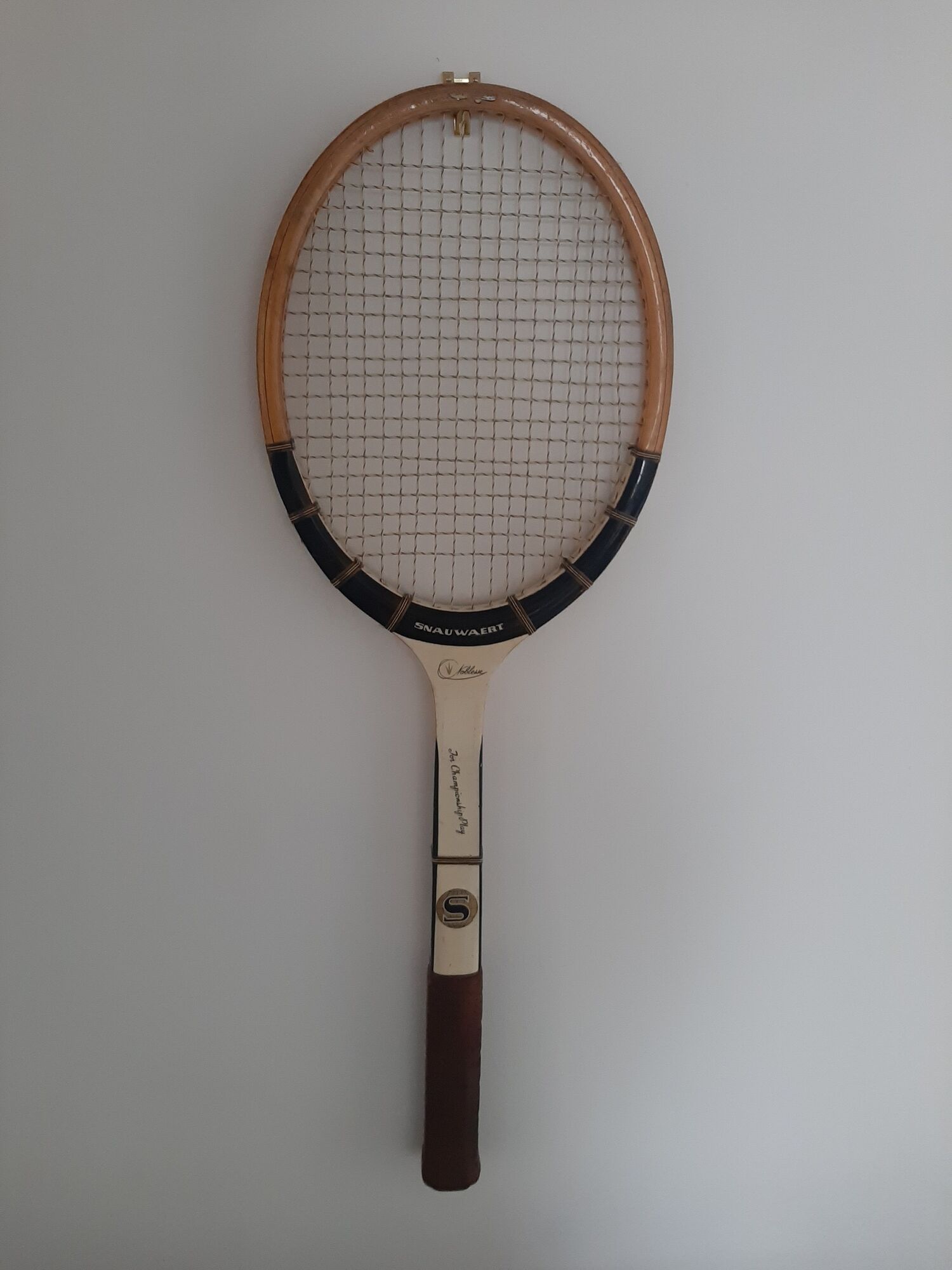 Raquette tennis vintage en bois Snauwaert