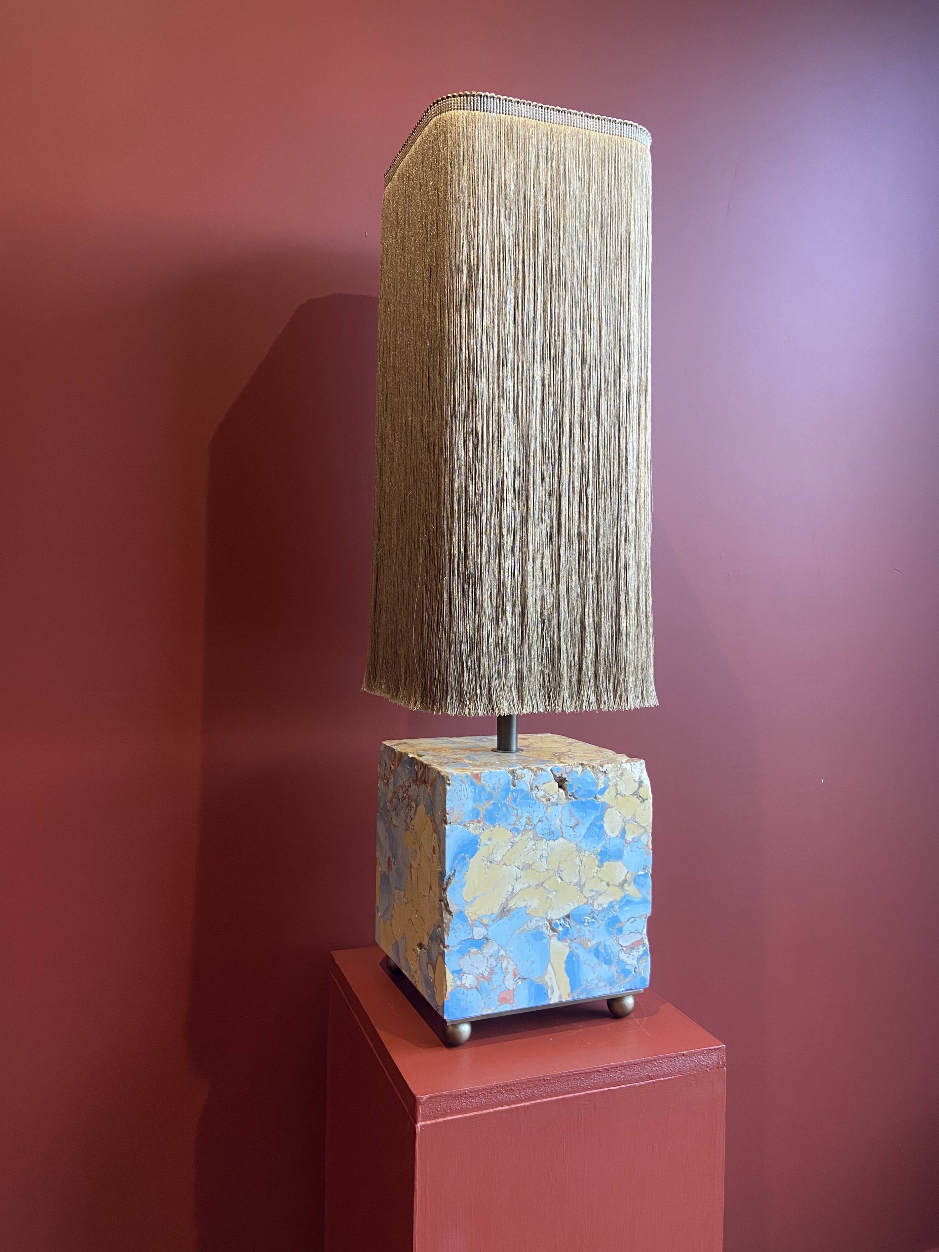 Base stuck blue beige marble-plaster, fringed lampshade Houles, 21st century.