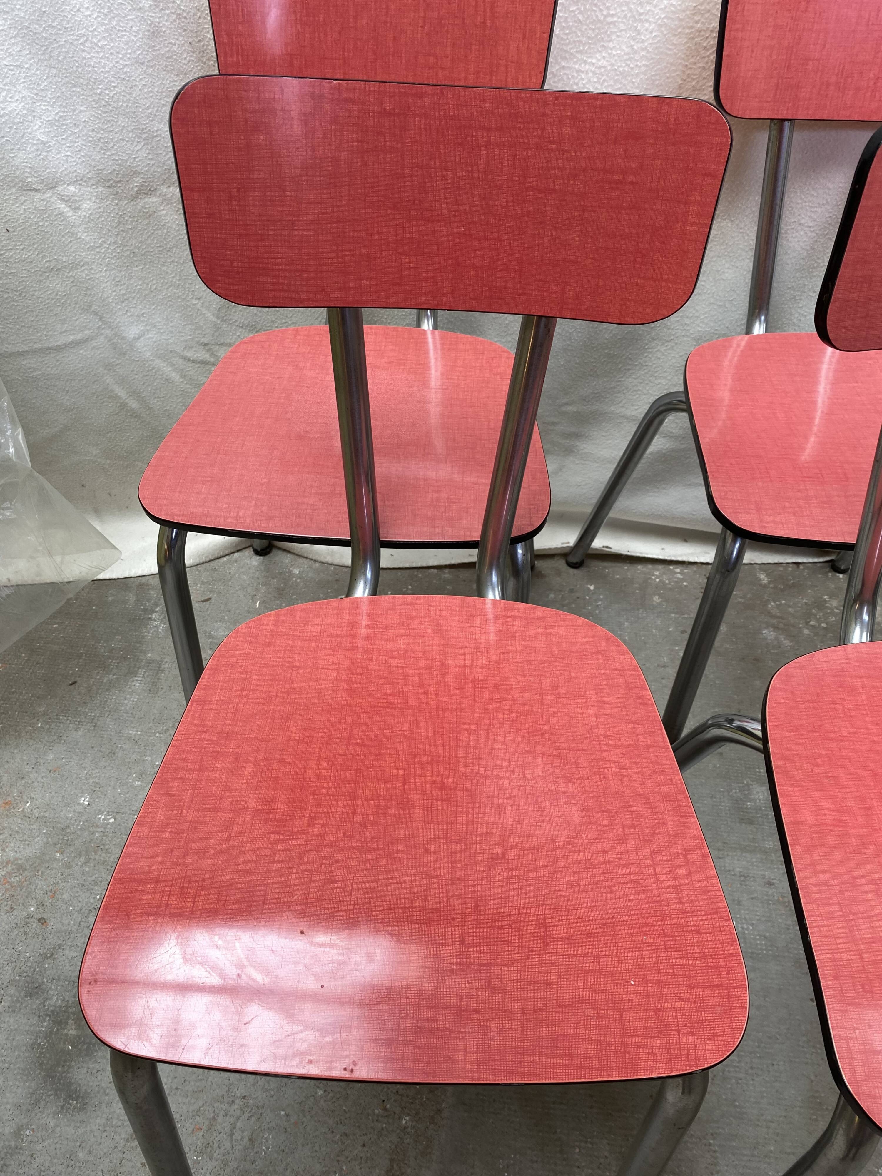 Suite of 4 red formica chairs