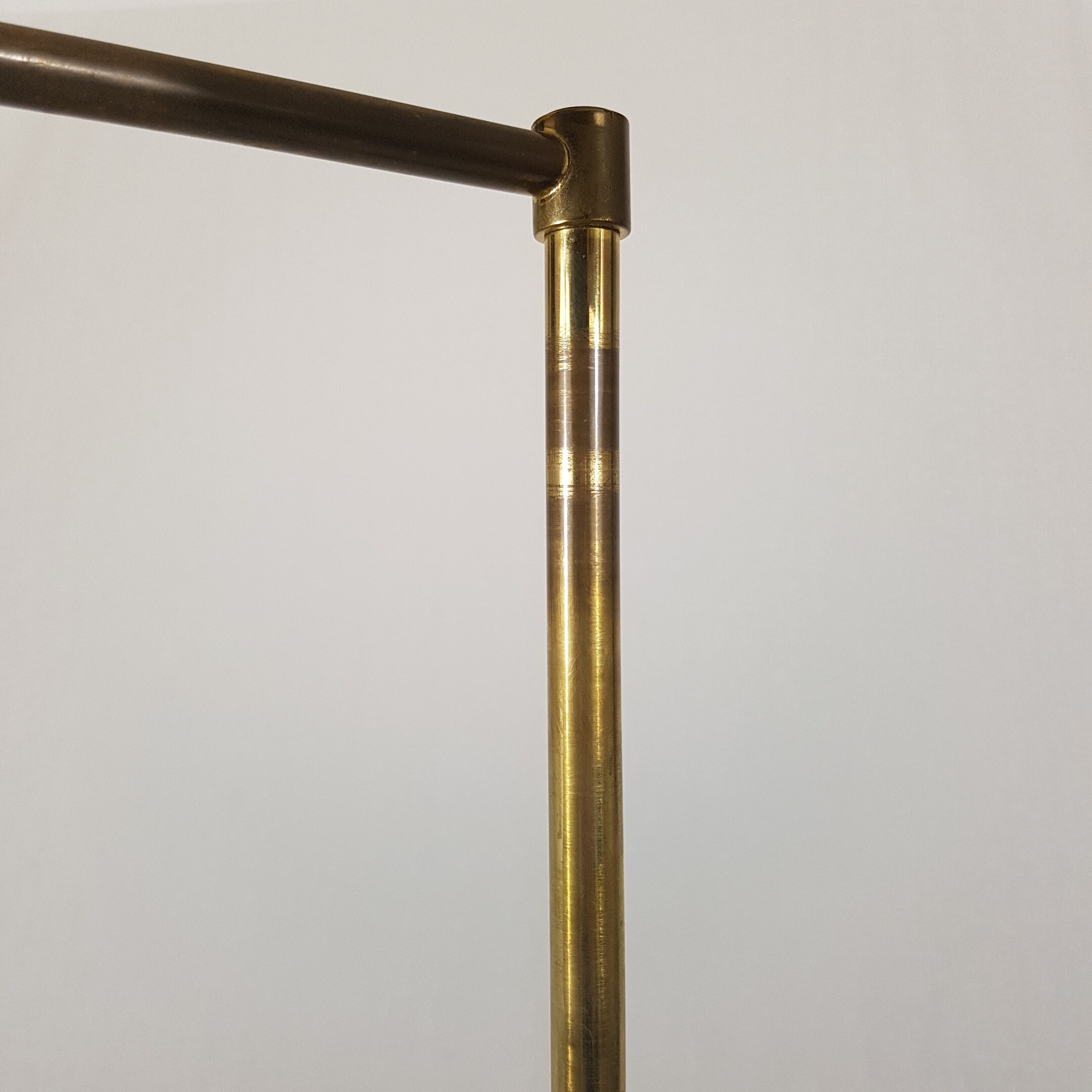 Articulated brass floor lamp
