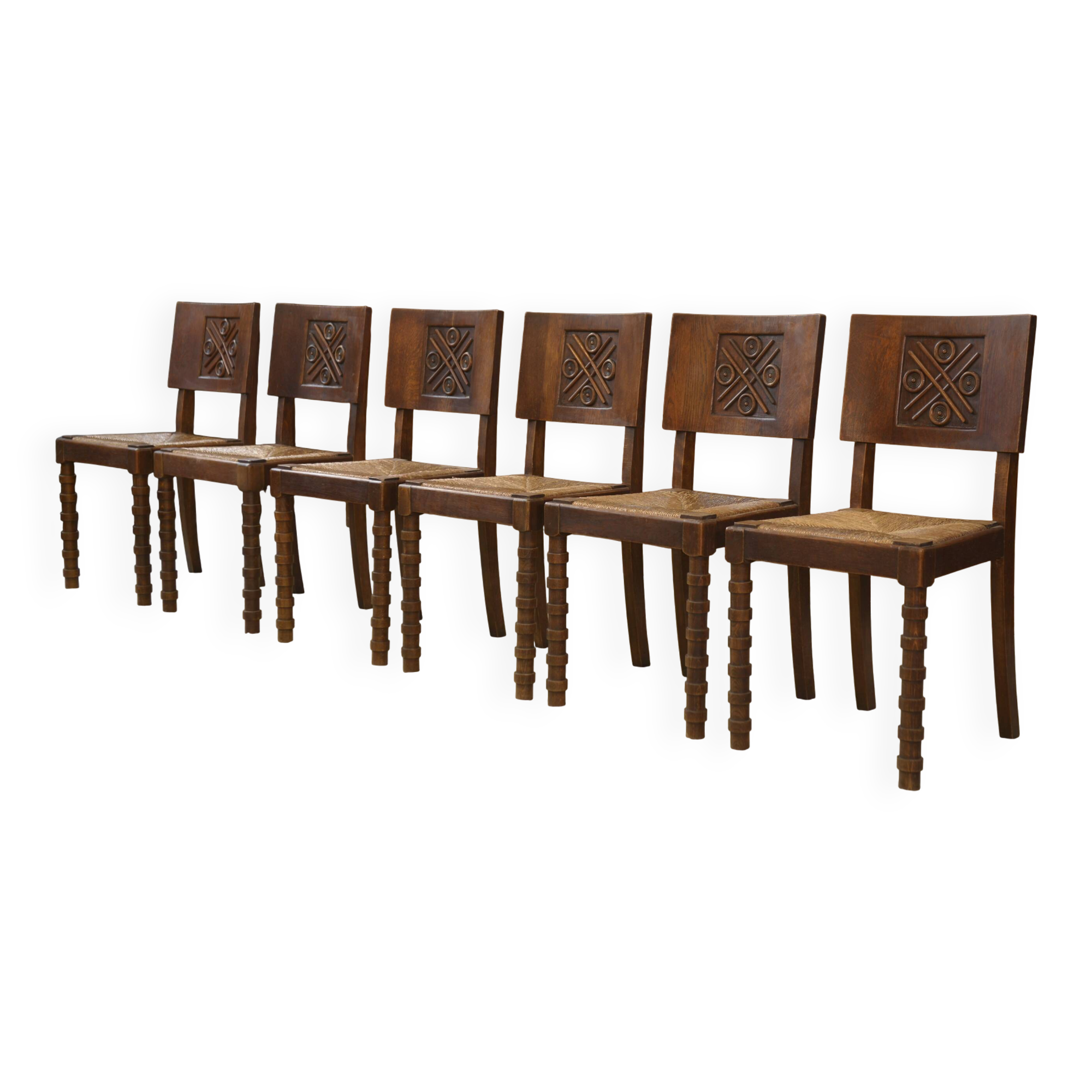 Ensemble de 6 chaises Charles Dudouyt en chêne 1950’s