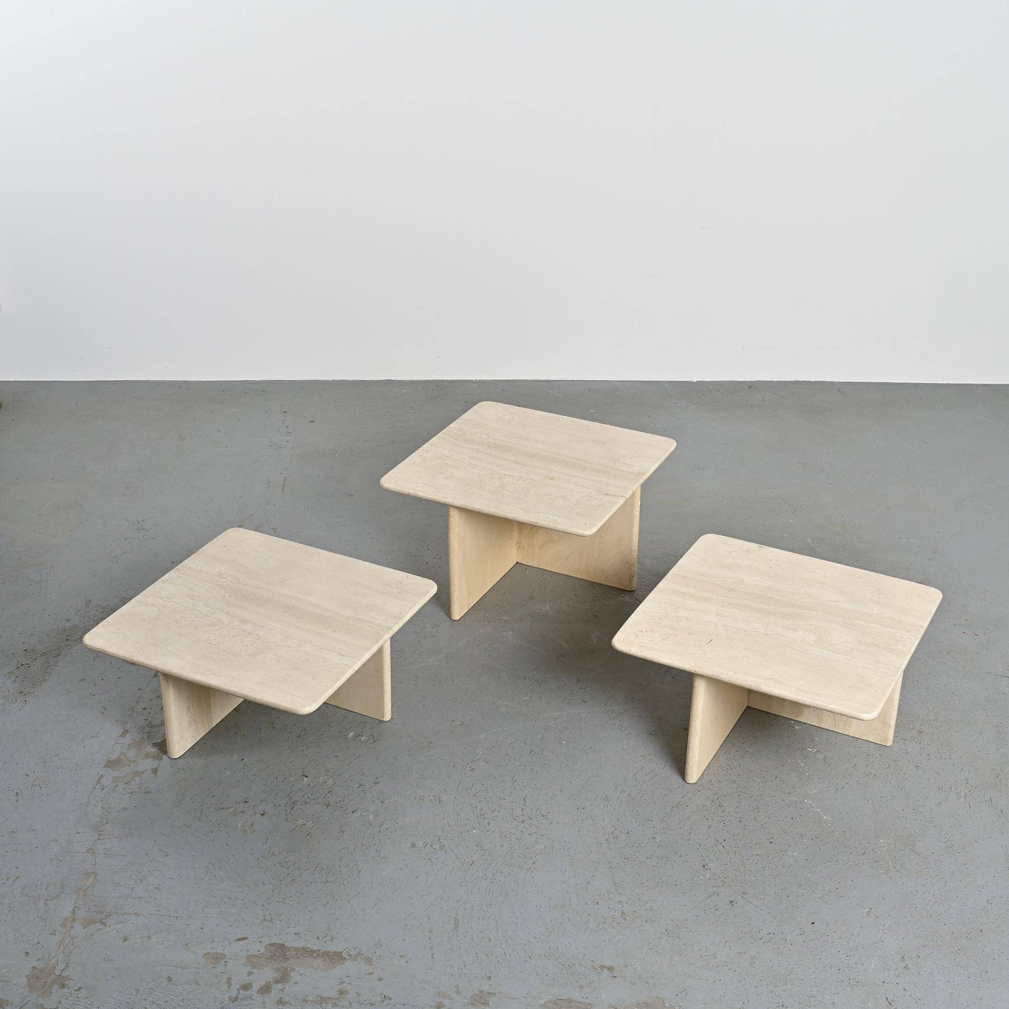 Set of three nesting tables in travertine, Italy circa 1970.