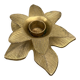 Old golden brass candle holder in the shape of a leaf or flower