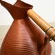 Studio pottery jug floor vase in terracotta and bamboo handle Germany 1950s