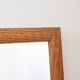 Mirror and its wooden frame