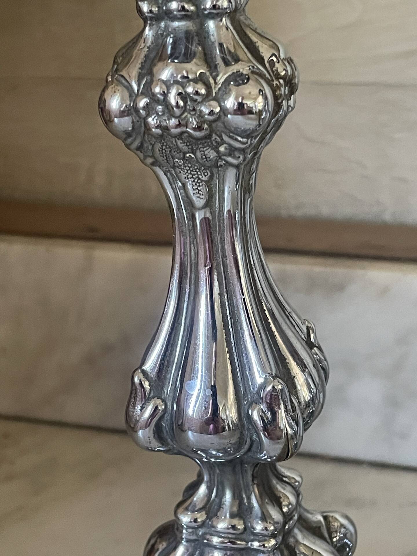 Pair of rococo silver-plated candlesticks