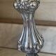 Pair of rococo silver-plated candlesticks