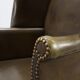 Mid-century Wing Back Armchair in green leather, UK