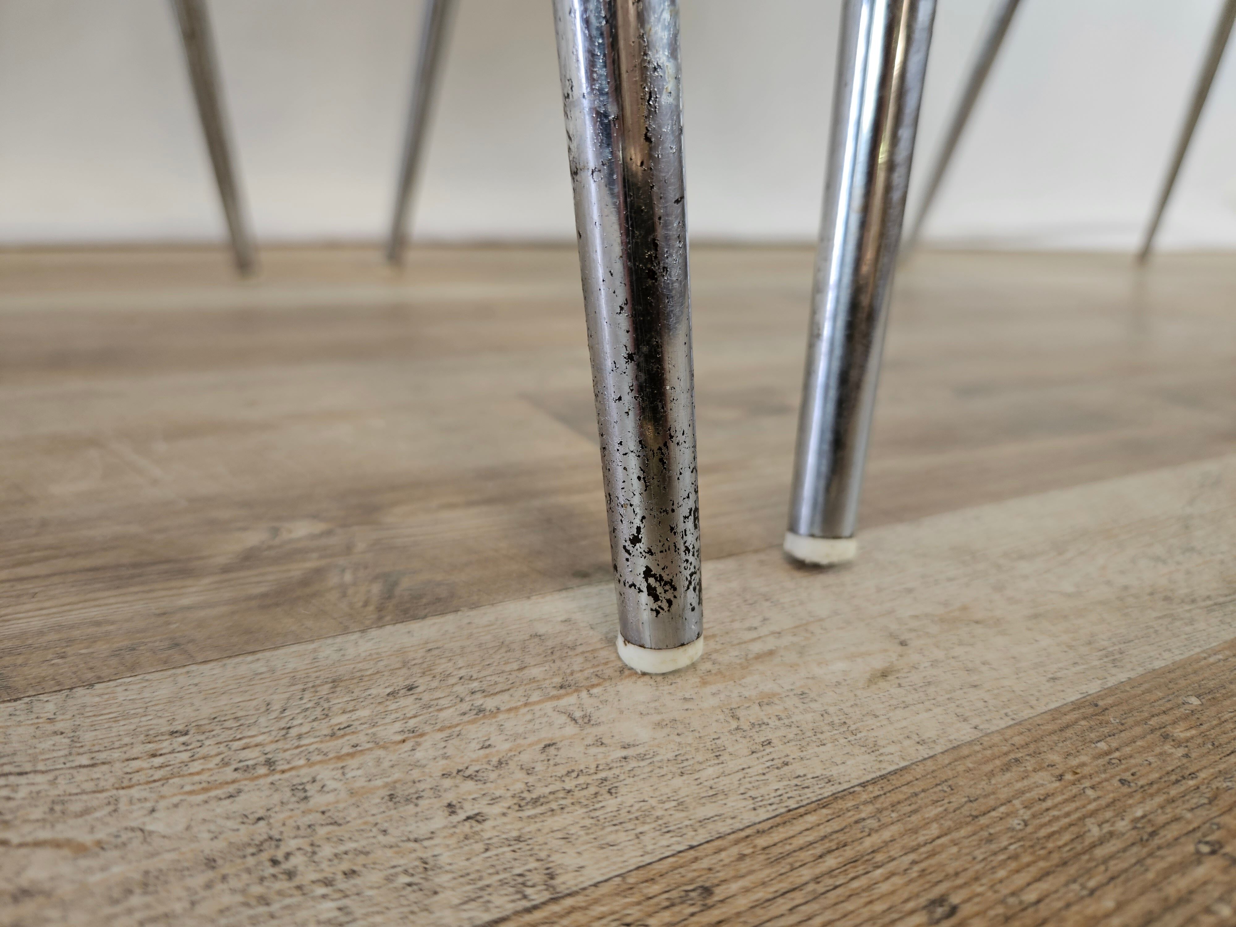 Set of four chairs in iron and skai 1970