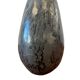 Vintage stone vase with worked fossil