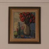 Bouquet rouge et bouteille de vin