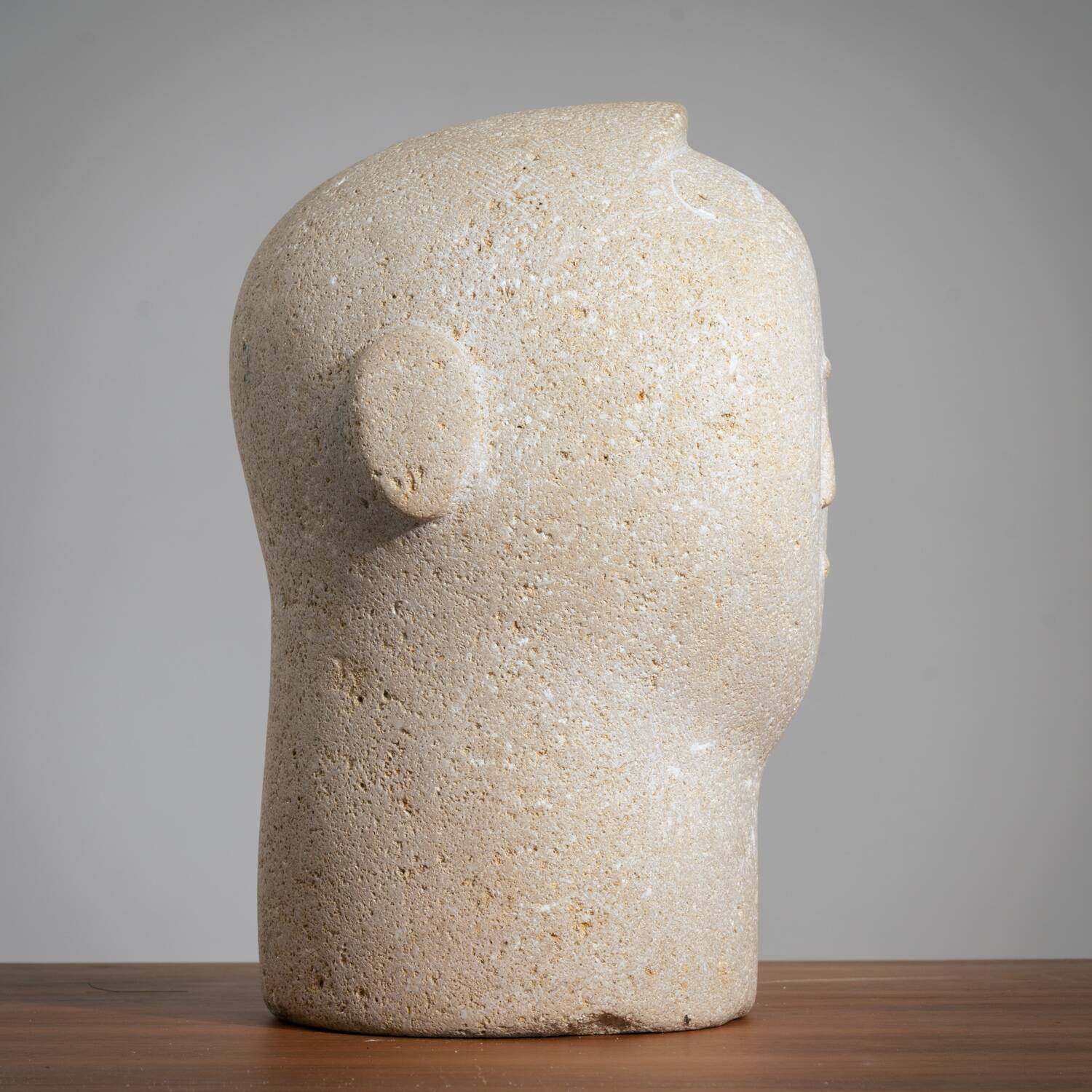 Modernist sculpted male bust in sandstone