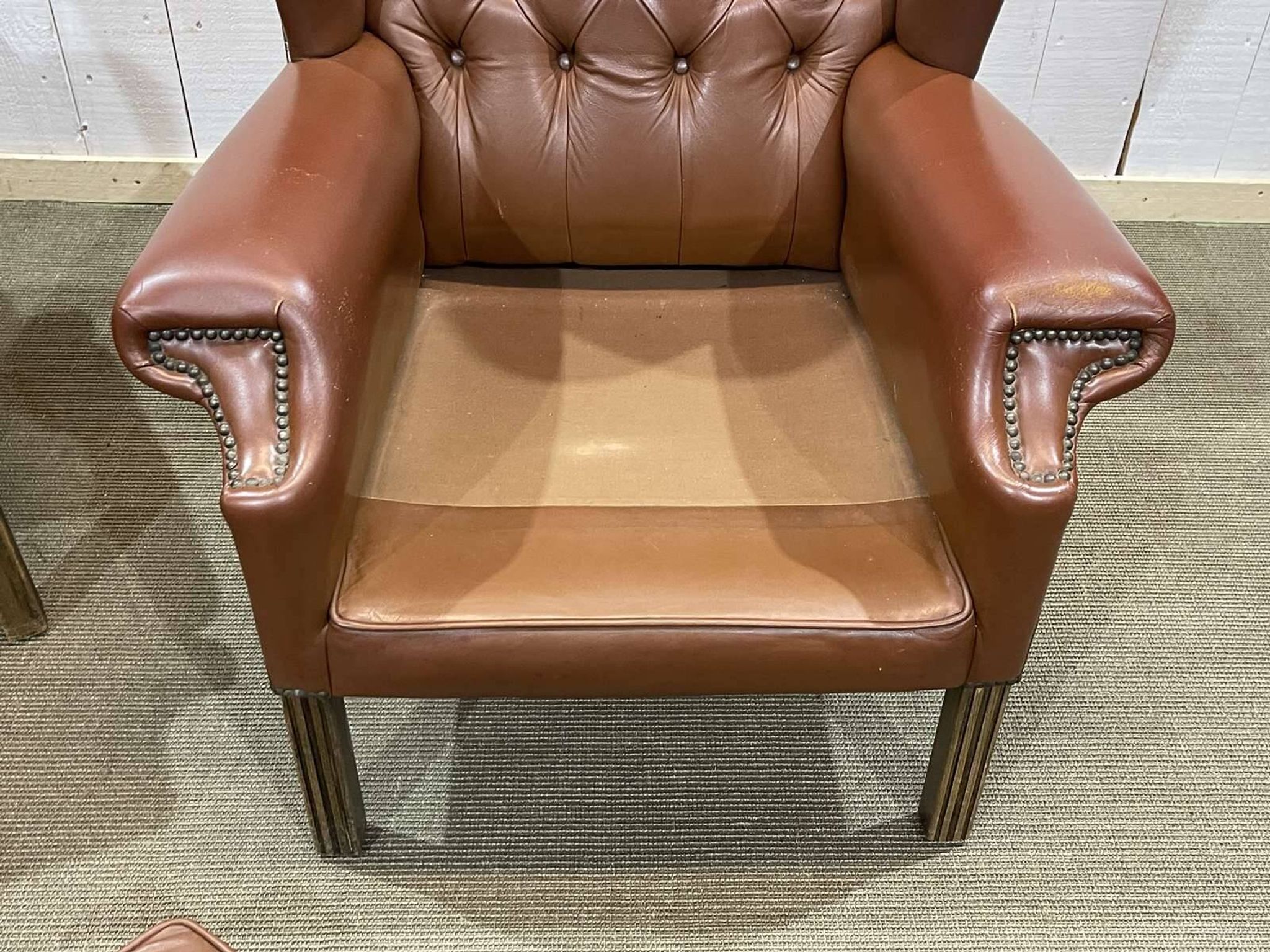 Pair of 1970s Chesterfield wingback chairs in brown leather