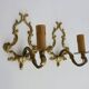 Vintage pair of bronze wall sconces from the 1950s and 60s.