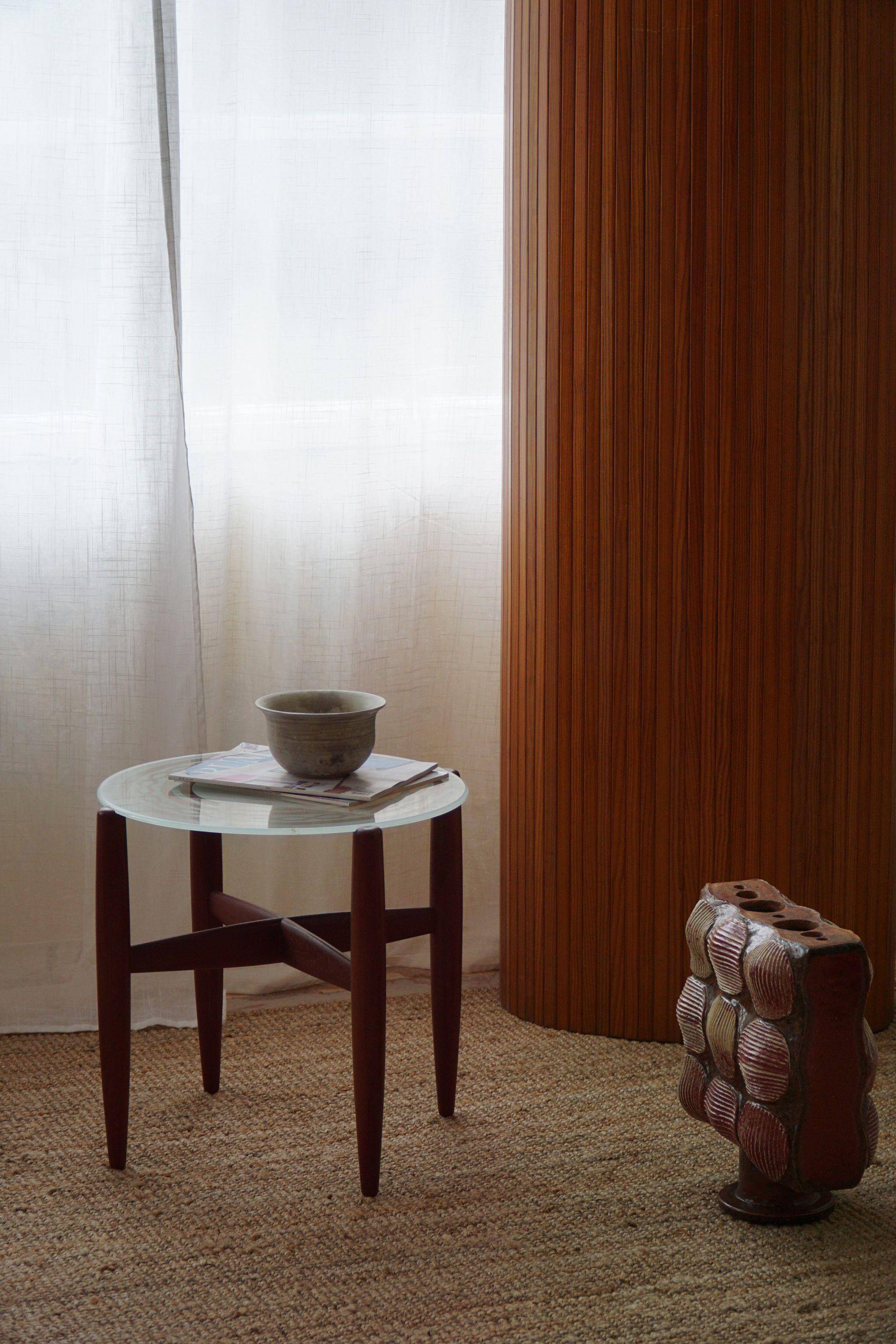 Teak and glass side table, mid-century Danish design, made in the 1960s.