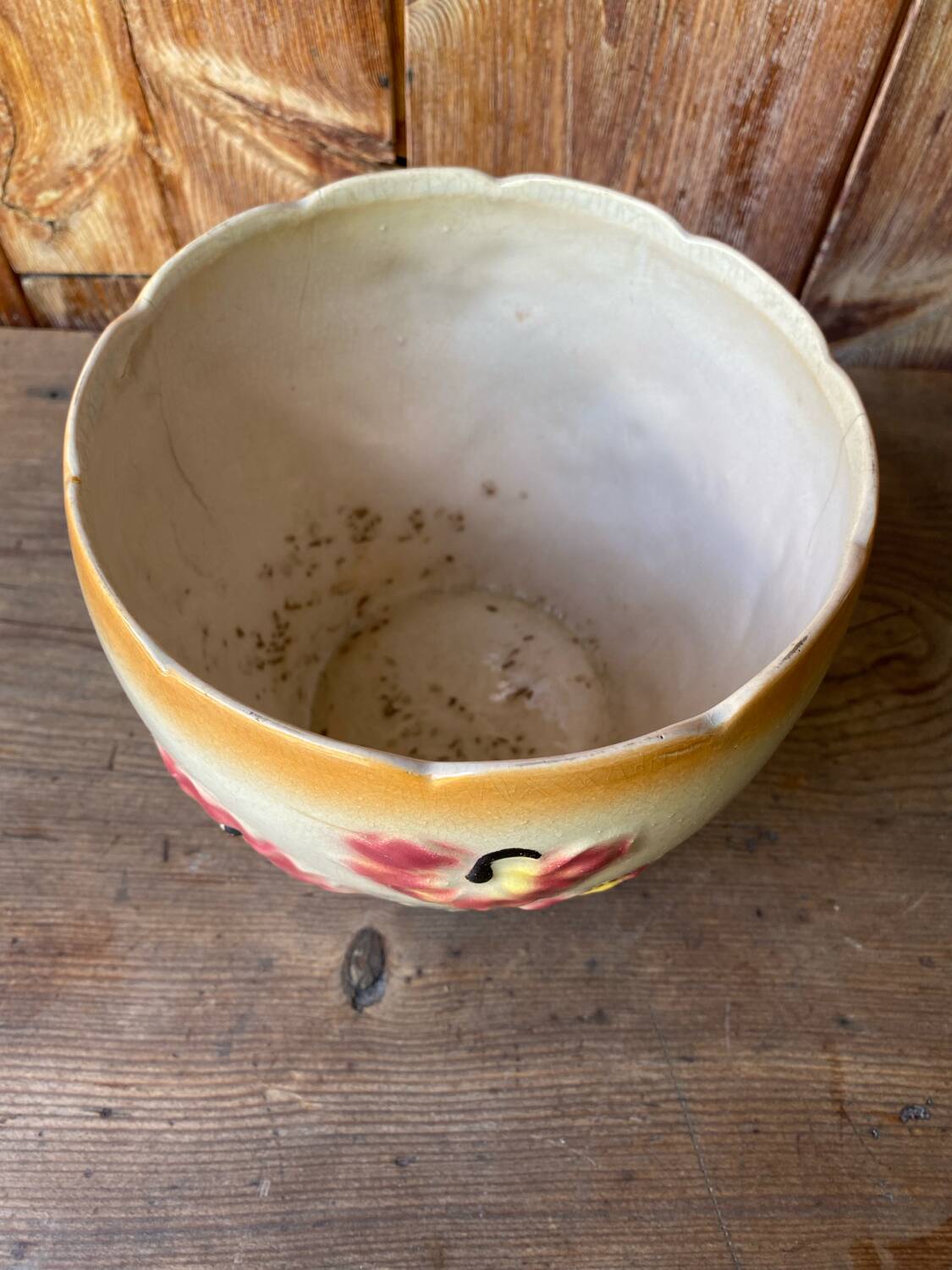 Earthenware cache pot with slip decoration.