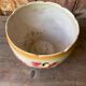 Earthenware cache pot with slip decoration.