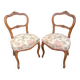 Pair of Louis XV chairs in carved walnut.