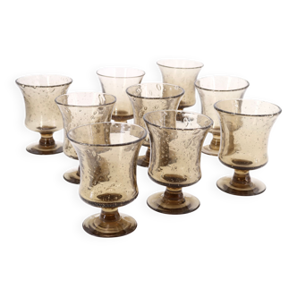 Nine stemmed glasses from Biot, brown bubble glass