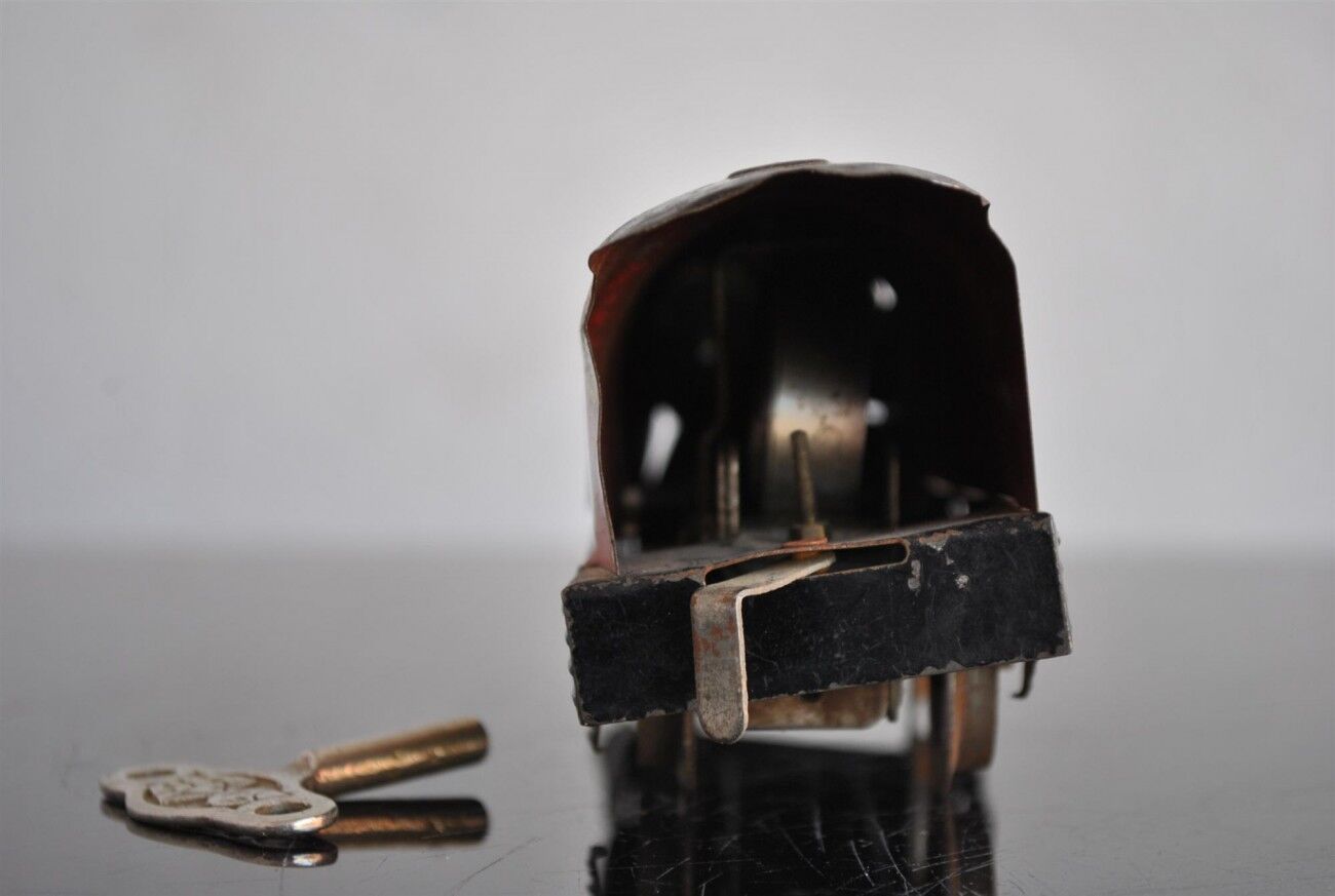 Tin litho brand LR spring-loaded toy locomotive