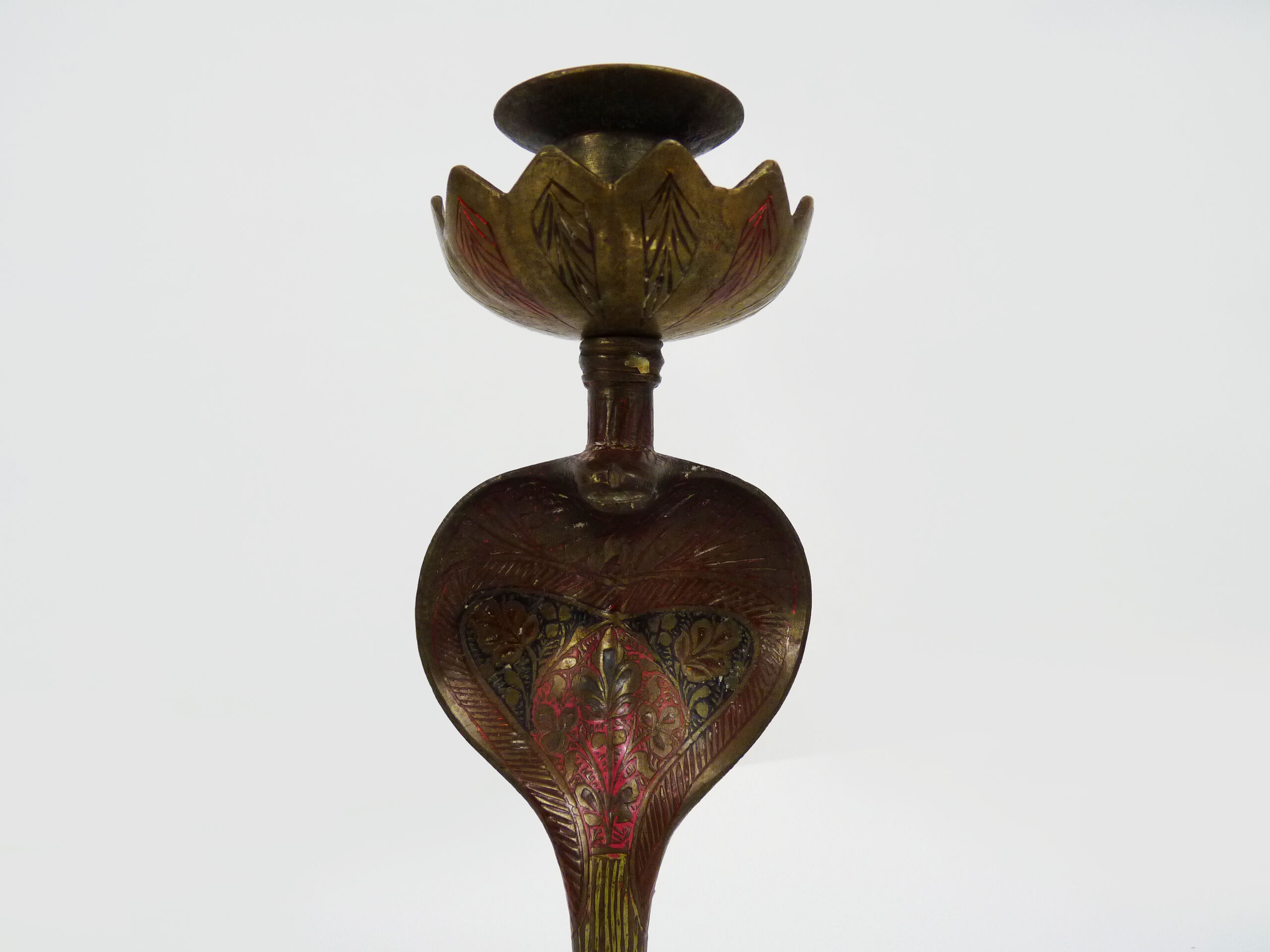 Pair of old bronze cobra candle holders with detailed engraving. Around 1950