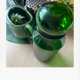 Emerald green glass bottle
