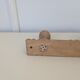 Wall-mounted coat rack with 3 hooks