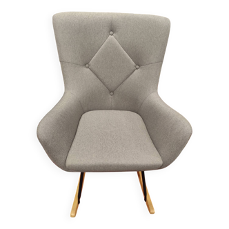Rocking-chair en tissu gris en état neuf