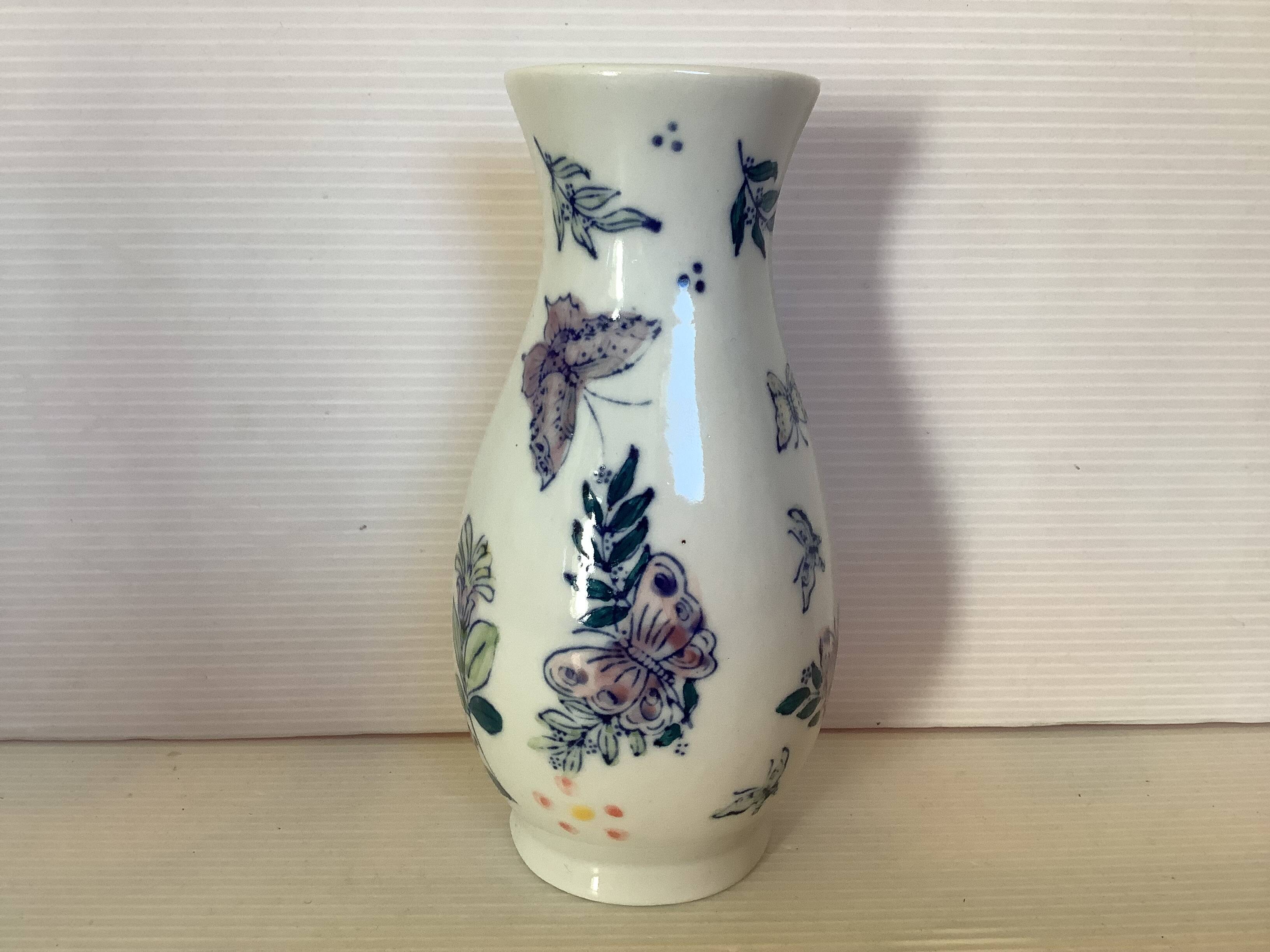 Flower vase with butterflies