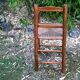 High wooden child chair, straw seating