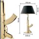 Starck gun lamp for flos