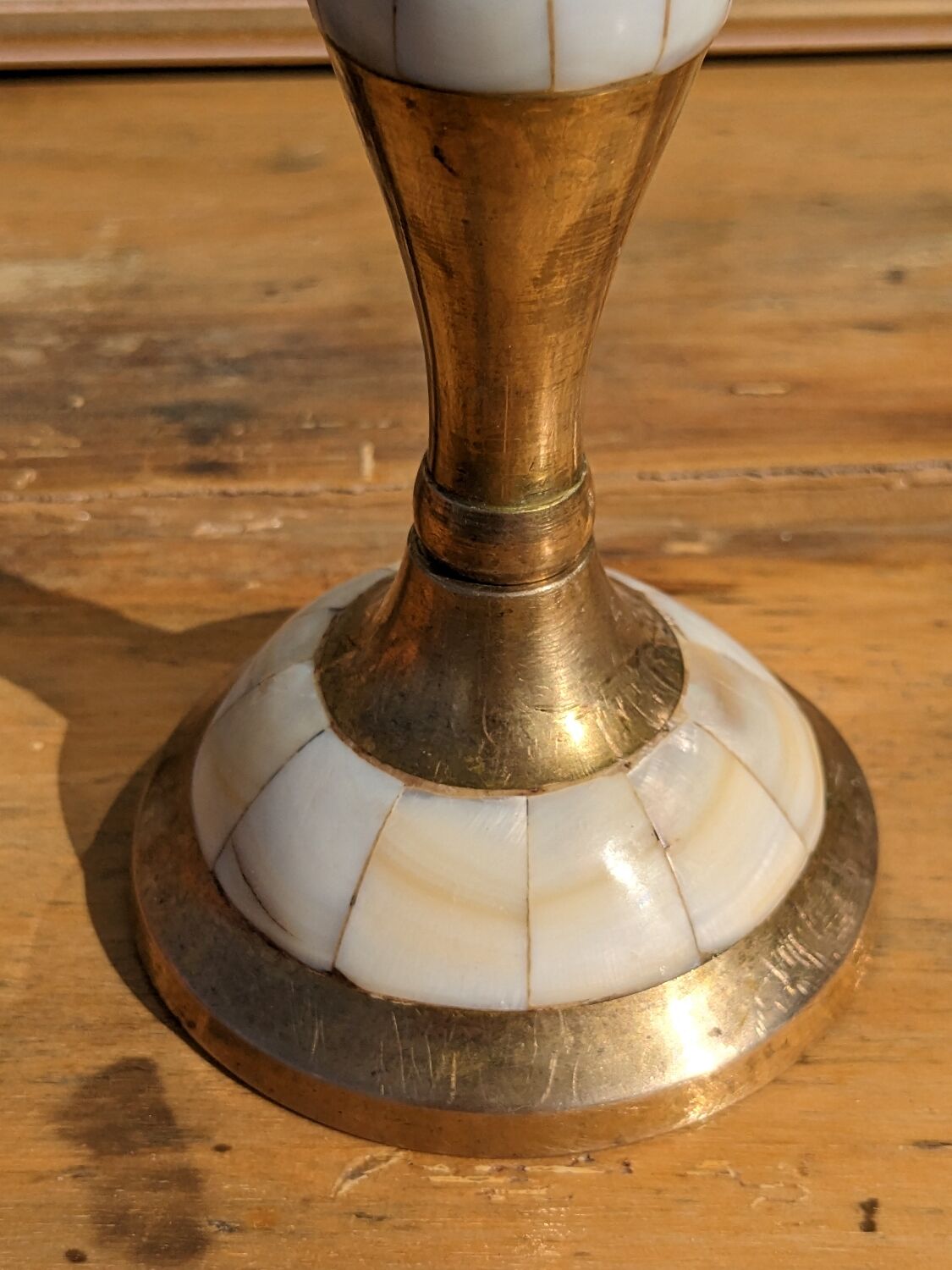 Brass and mother-of-pearl candle holder