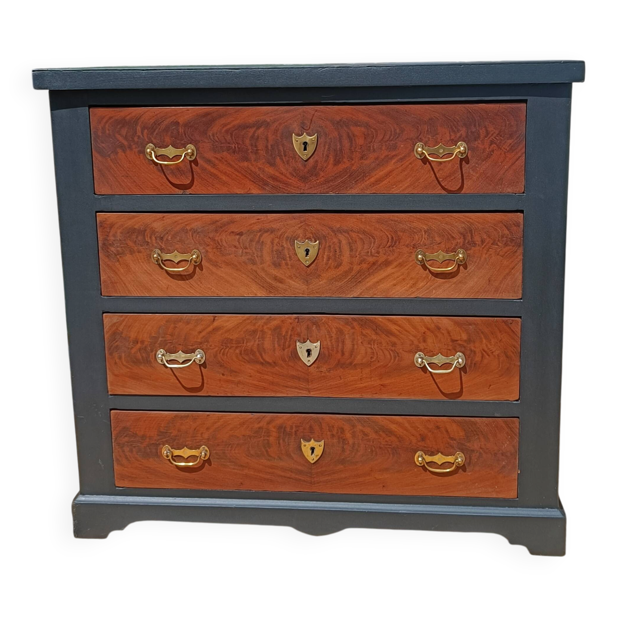 Vintage commode revamped in matte black & wood with warm tones.