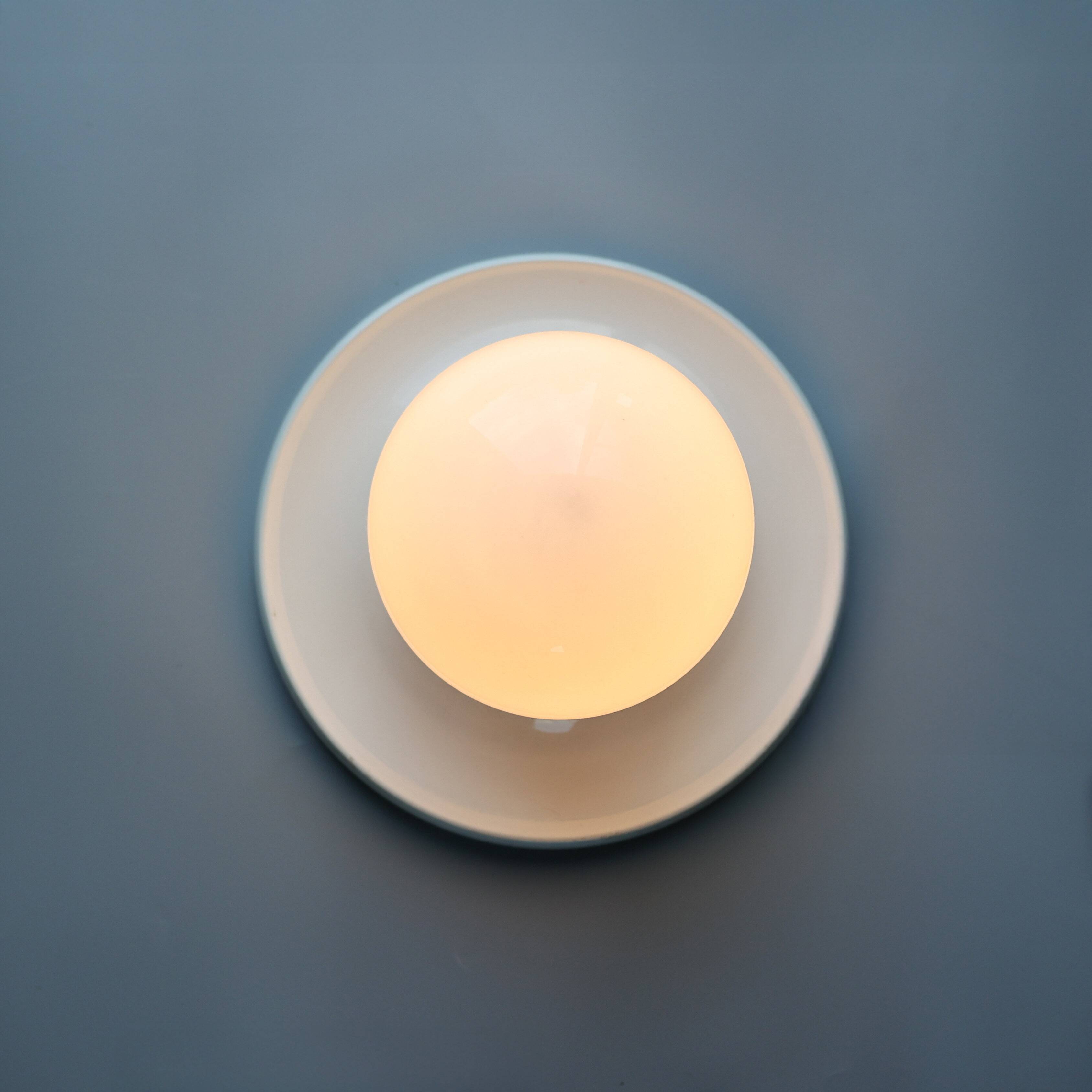 Light ball sconce by Achille & Pier Giacomo Castiglioni, 1970s, Italy.