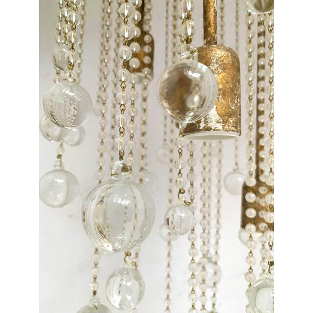 Contemporary cascade of transparent cristals murano glass chandelier