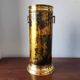 Flame-patterned golden umbrella stand