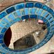 Round ceramic mirror with blue mosaic decor circa 1960