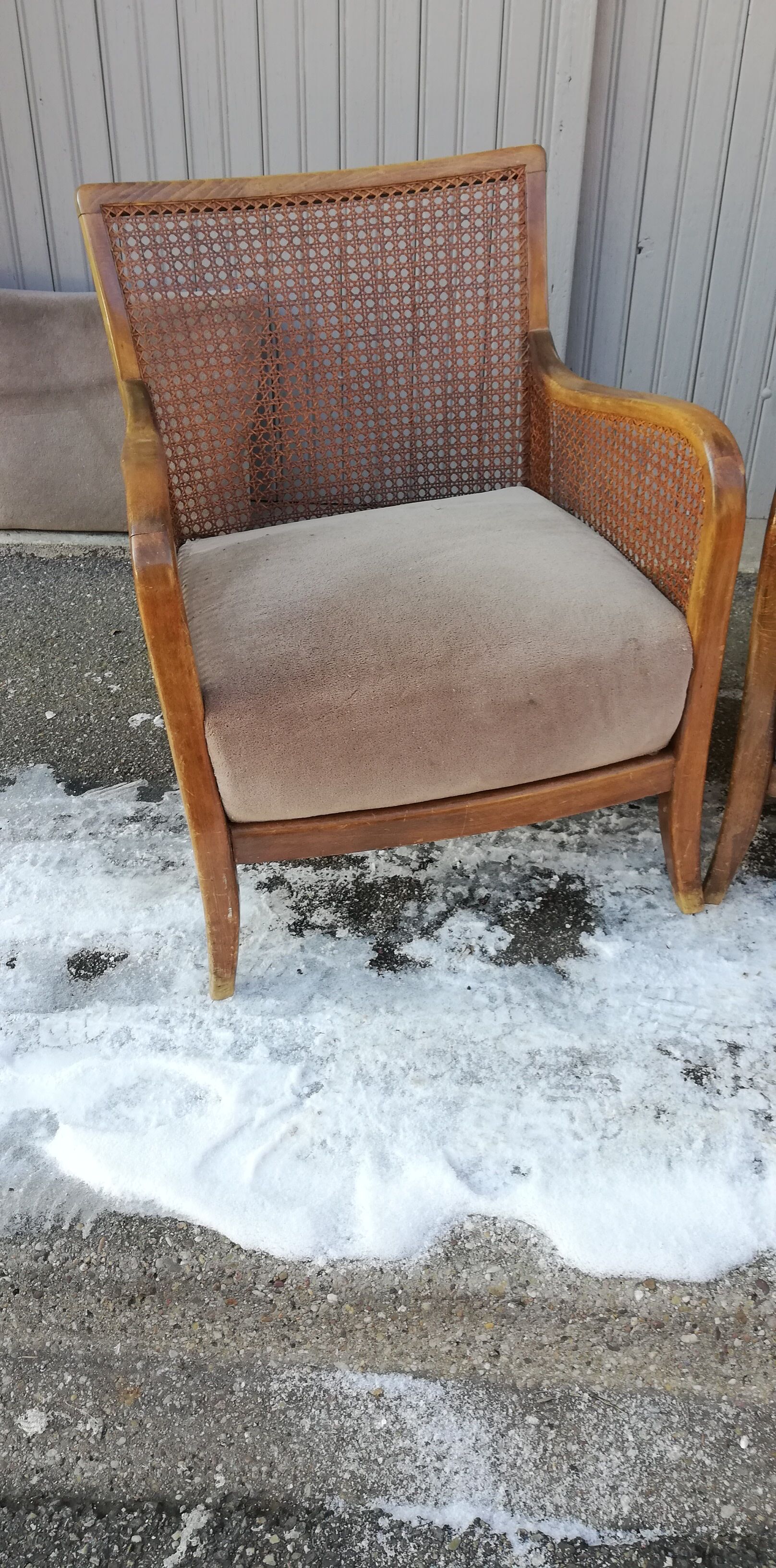 Pair of vintage cannage and fabric armchairs