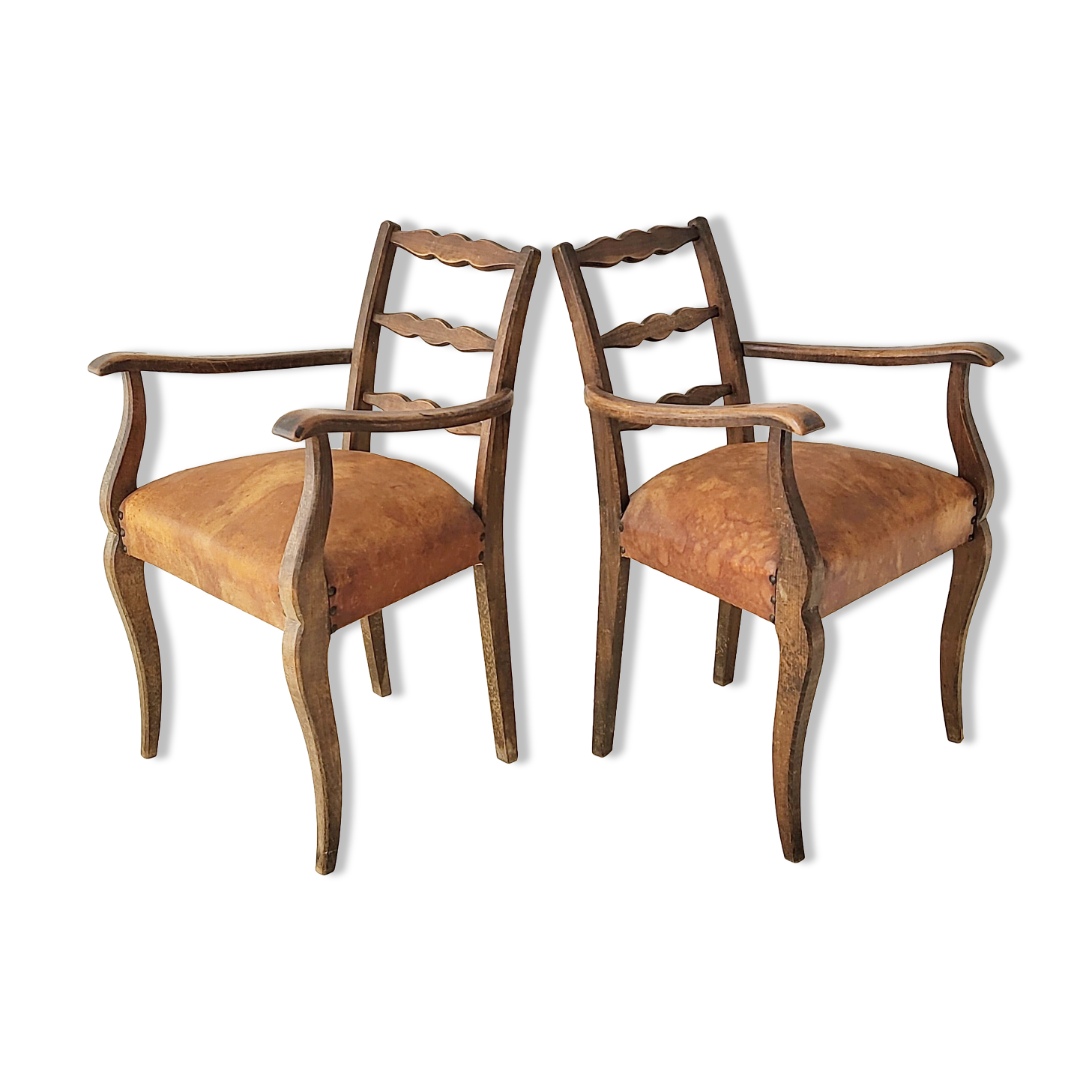 Pair of vintage leather armchairs