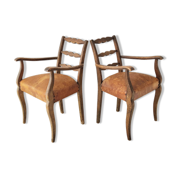 Pair of vintage leather armchairs