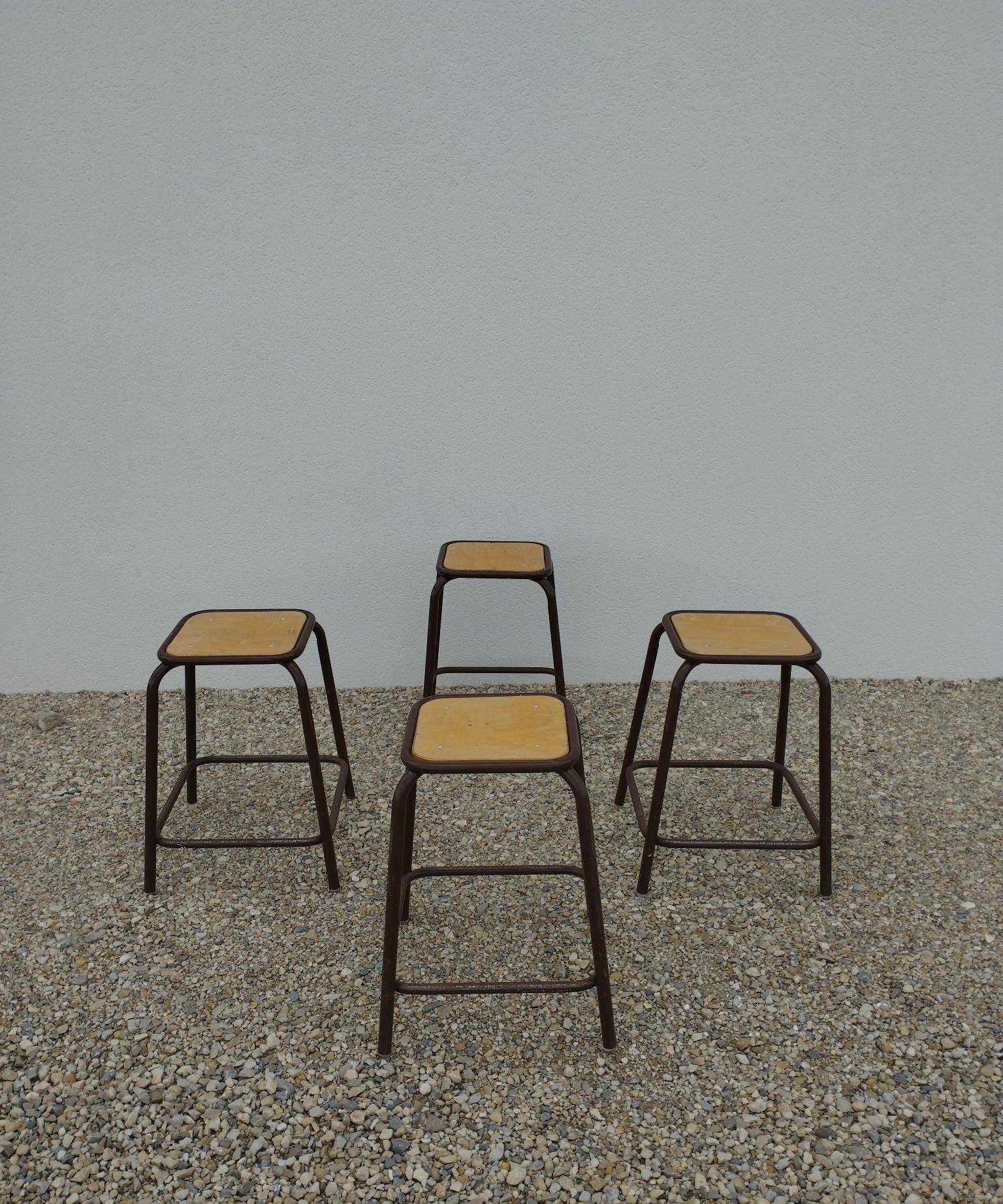 4 vintage stackable workshop stools from Mullca.