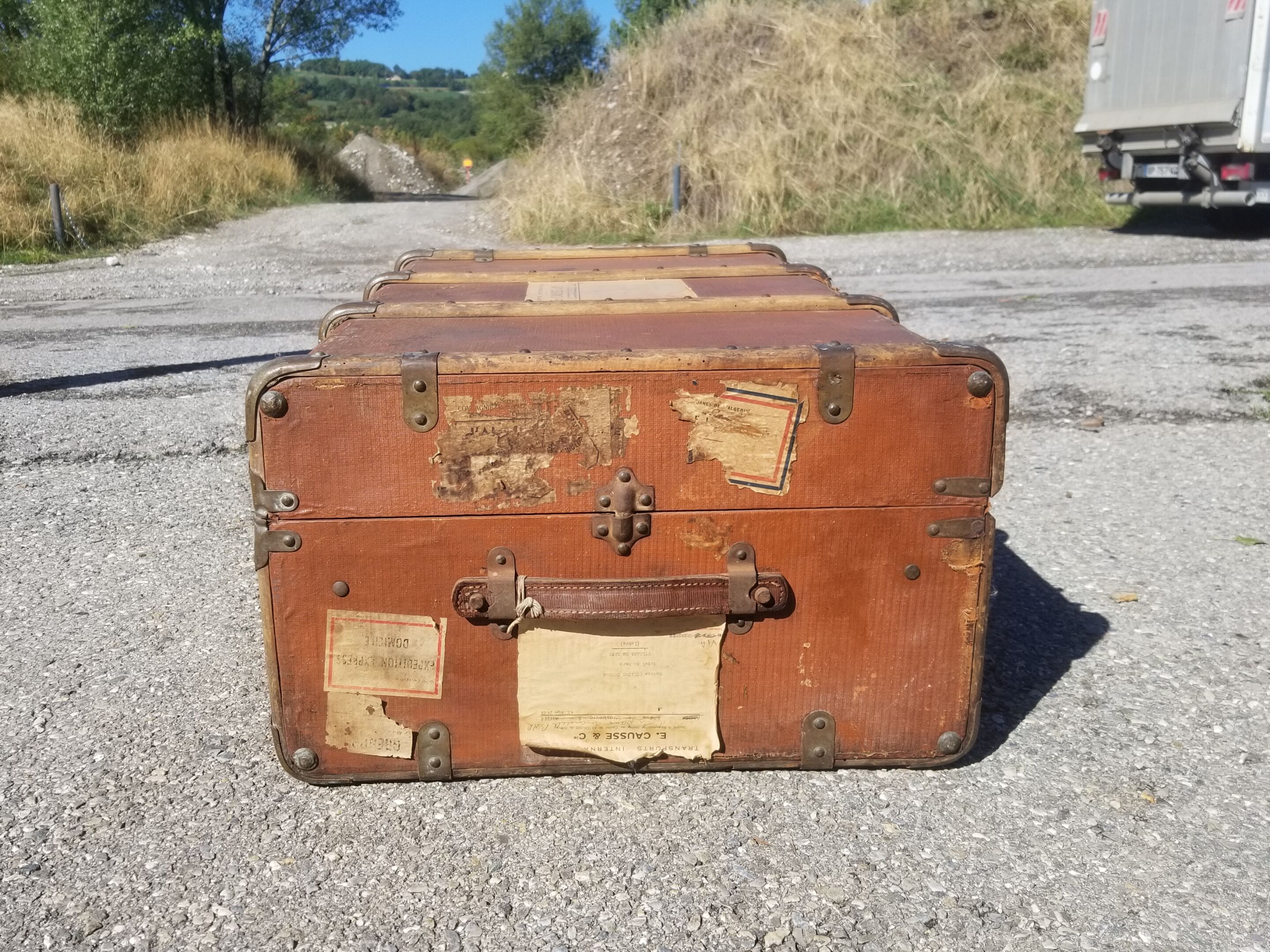 Old travel trunk made of wood and brass