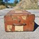 Old travel trunk made of wood and brass